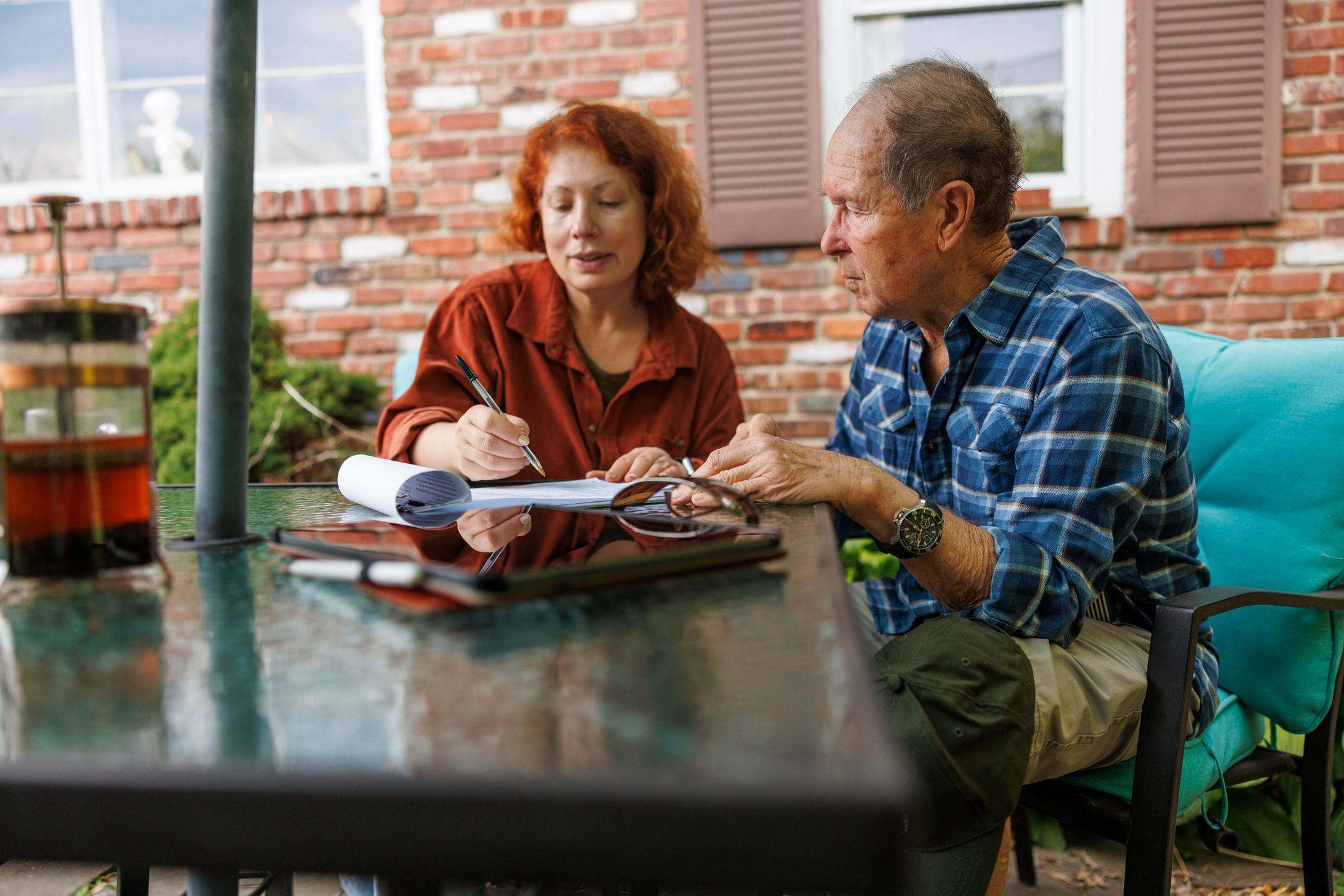 Advisor reviewing policy details with a client