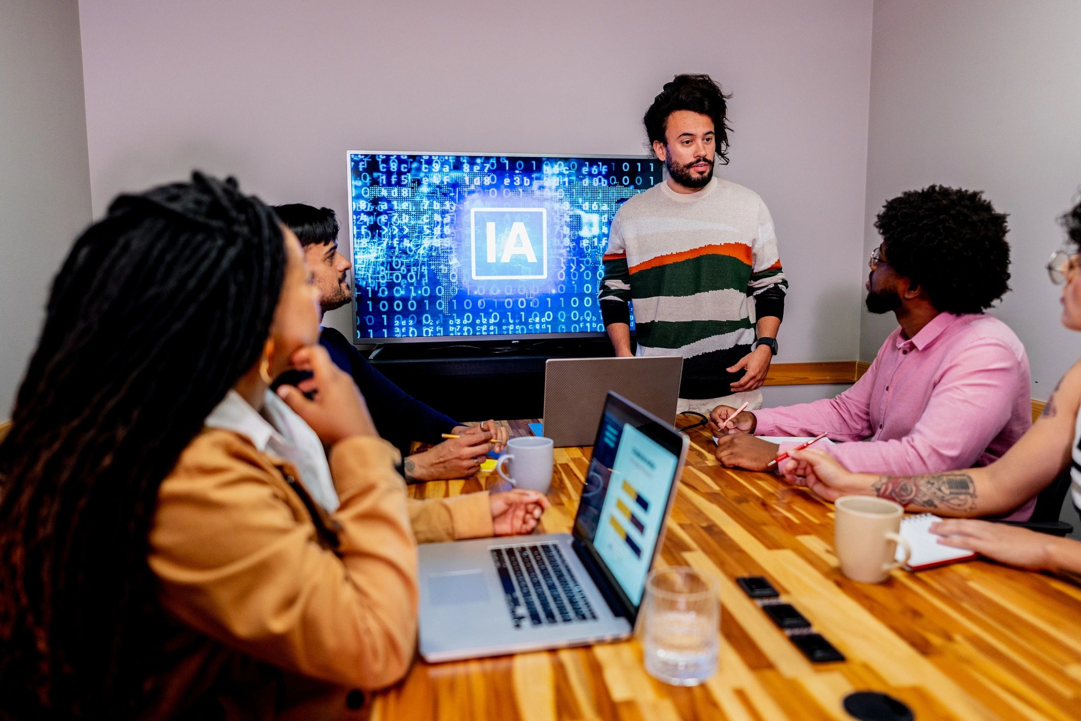 Consultants in a professional office discussing a case